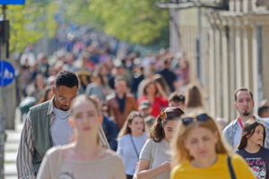Lots of people on sidewalk